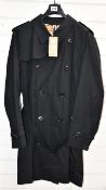 An as new Burberry Chelsea trench coat in black (EU 58 - RRP £1450).