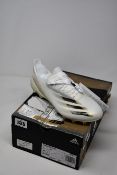 A pair of as new Adidas X Ghosted.1 AG football boots (UK 7).