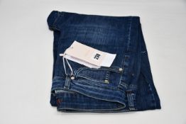 A pair of as new iBlues Pucci jeans (UK 10).