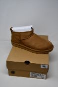 A pair of as new Ugg Classic Ultra Mini (UK 7).