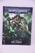 Nine as new Warhammer 40,000 Codex: Necrons hardback books (Eight Spanish, one English Edition).