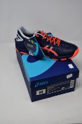 A pair of as new Asics Netburner Super FF 2 trainers (UK 6.5).