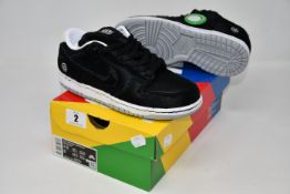 A pair of as new Nike Be @ Brick SB Dunk Low OG (UK 4).