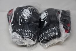 A quantity of boxed as new Ultimate athlete mixed martial artists gloves (In various sizes) (