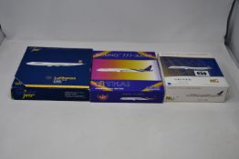 A boxed Next Generation Model United Boeing 787-10 Dreamliner (56002), a boxed Thai Boeing 777-300ER