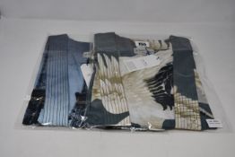 Two as new One Hundred Stars Stork kimonos and two Eiffel Tower kimonos (RRP £40 each).