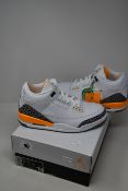 A pair of women's as new Nike Air Jordan 3 Retro Laser Orange trainers (UK 5).