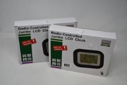 Seven boxed as new Youshiko Radio Controlled Jumbo LCD Clock (YC8021).