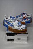 A pair of as new Nike Air Rubber Dunk Off-White UNC trainers (UK 10.5).