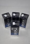 Four boxed as new Hugo Boss Bottled Night eau de toilette (100ml).