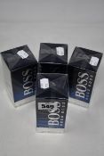 Four boxed as new Hugo Boss Bottled Night eau de toilette (100ml).