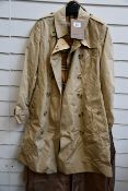 An as new Burberry The Chelsea trench coat with coat bag (UK 6 - RRP £1490).