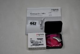 A boxed as new Signia Contrast S+ hearing aid in silver.