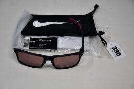 A pair of as new Nike Maverick RGE E sunglasses with protective pouch (RRP £137).
