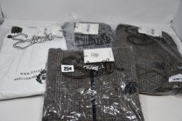 Four items of as new Silk Silk clothing; two smart cuff pants (L), Distressed Prestige skinny