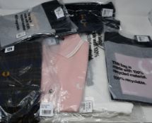 An as new Fred Perry twin tipped polo (L) and Fred Perry scarf together with three children's Fred