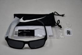 A pair of as new Nike Maverick RGE E sunglasses with protective pouch (RRP £137).