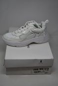 A pair of as new Calvin Klein Jeans Maya trainers (UK 6).