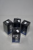 Four boxed as new Hugo Boss Bottled Night eau de toilette (100ml).