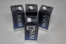 Four boxed as new Hugo Boss Bottled Night eau de toilette (100ml).