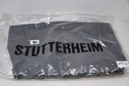 One ladies as new Stutterheim Moseback raincoat in grey (XXS).