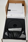 A pair of boxed Bose On-Ear Wireless Headphones in black.