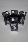 Four boxed as new Hugo Boss Bottled Night eau de toilette (100ml).