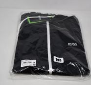 An as new Hugo Boss zip hooded top (L - RRP £120).