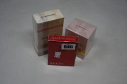 A Gucci Rush eau de toilette (50 ml), a Burberry Blush eau de parfum (50 ml) and a Burberry for
