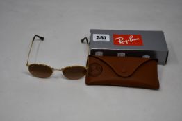 A pair of as new Ray Ban sunglasses.