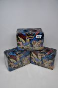 Three boxed as new Pokemon trading cards collectors chests.