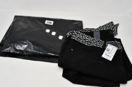 An as new Marc O'Polo black trousers (W31/L32 - RRP €140).