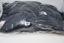 An as new The North Face Hmlyn down parka (XXL).