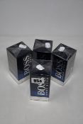 Four boxed as new Hugo Boss Bottled Night eau de toilette (100ml).