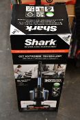 A boxed as new Shark cordless vacuum cleaner, model: IC160EUT.