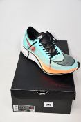 A pair of as new Nike ZoomX Vaporfly Next% HKNE trainers (UK 10.5).