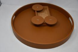 One three piece set of Lucrin Geneva home décor to include one Lucrin Amo set of twelve coasters,