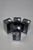 Four boxed as new Hugo Boss Bottled Night eau de toilette (100ml).