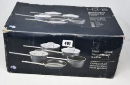 A boxed as new Dura Forge Prestige five piece cookware set and a boxed Home five piece hard anodised