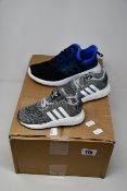 Three pairs of children's as new Adidas Swift Run 1 trainers (K7, 8.5, 9.5) and two pairs of