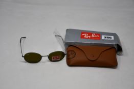 A pair of as new Ray Ban sunglasses.