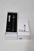 Two boxed as new handheld portable microdermabrasion tools.