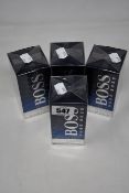 Four boxed as new Hugo Boss Bottled Night eau de toilette (100ml).