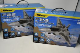 Two boxed as new Top Race F22 Raptor 4 channel remote control airplanes (TR-F22B).