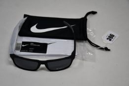 A pair of as new Nike Maverick RGE E sunglasses with protective pouch (RRP £137).