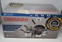 One boxed as new Circulon five piece stainless steel cookware set.