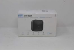 A boxed as new Blink Outdoor Smart Security Camera System in Black (1 camera set UK) (Box sealed).