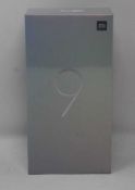 A boxed as new Xiaomi Mi 9 Global Version 6GB RAM 64GB Storage Android Smartphone in Ocean Blue