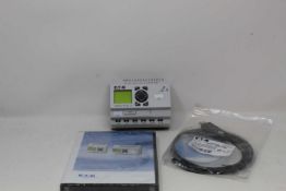 A boxed as new Eaton easy Logic Module Starter Kit (EASY-BOX-721-DC-USB) (Exterior box damaged).