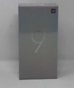 A boxed as new Xiaomi Mi 9 Global Version 6GB RAM 128GB Storage Android Smartphone in Ocean Blue